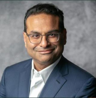 a man wearing a suit and tie