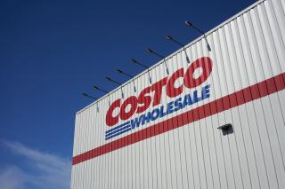 a close up of a costco logo on a warehosue