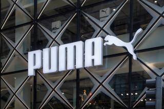the "puma" logo atop a retail store