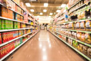 a blurry image of a grocery store