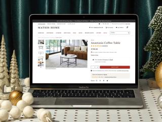 A photo illustration showing Mathis Marketplace on a laptop screen.