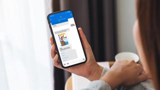A photo illustration showing the graphical user interface for Walmart's Text to Shop.