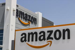 The Amazon logo on a building.