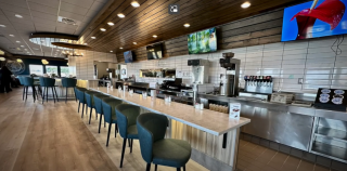 A photo showing the counter at the Fork and Compass restaurant.
