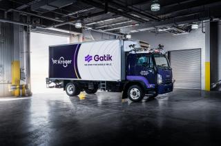 A photo of a Gatik/Kroger truck in a warehouse.