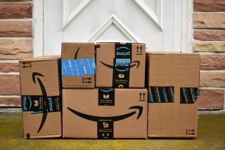 Amazon boxes on a doorstep.