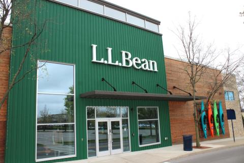a sign in front of a building