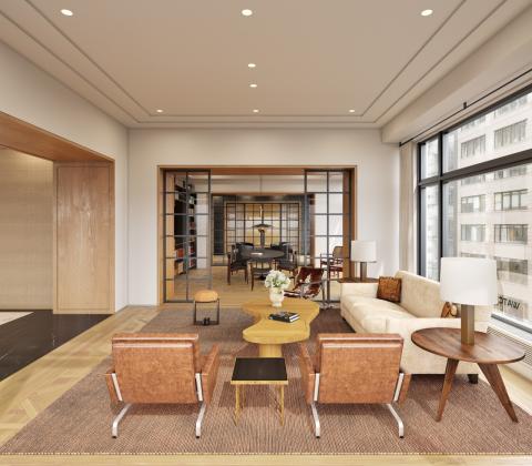 a living room filled with furniture and a large window