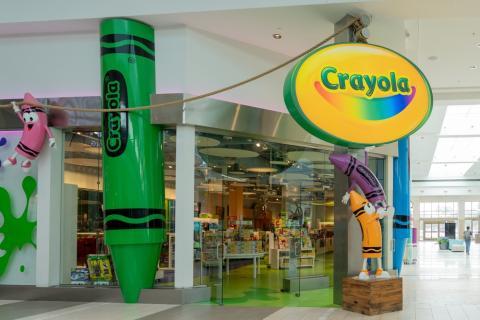 a person standing in front of a store