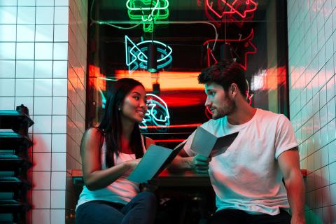 couple looking at a menu