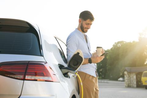 man at gas pump
