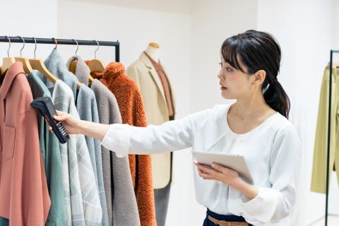 sales associate scanning RFID tags