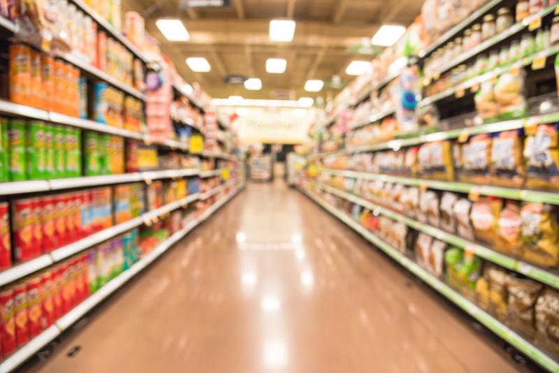 a blurry image of a grocery store
