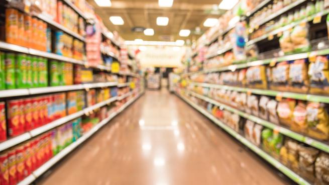 a blurry image of a grocery store
