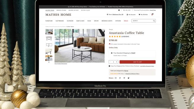A photo illustration showing Mathis Marketplace on a laptop screen.