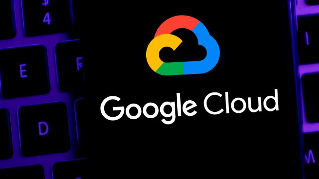 The Google Cloud logo on top of a laptop keyboard.