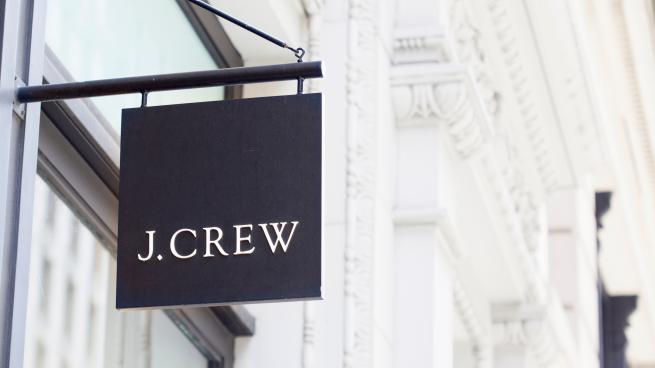 A J. Crew sign on a building.