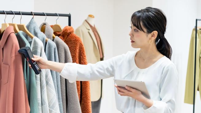 sales associate scanning RFID tags